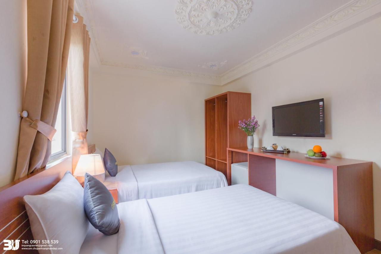 Cosmo Square Hotel Ho Si Minh-város Kültér fotó
